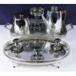 Two silver plated trays, coffee and water pots and candlesticks