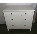 A painted pine chest of three drawers