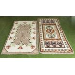 Two hand made rugs