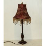 A table lamp and shade