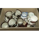 A box of cups and saucers