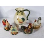 A jug, cockerel cruet and two others