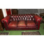 A three seater leather Chesterfield sofa