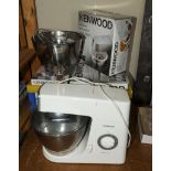 A Kenwood Chef Classic with attachments