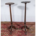 Two mid 20th century mahogany torcheres