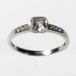A 9ct white gold ring set with a cubic zirconium, size P