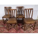 A set of 4 oak chairs