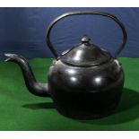 A Victorian iron kettle