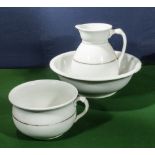 A white jug and bowl with chamber pot bowl chipped