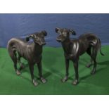 A pair of cast greyhound figures