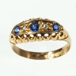 An 18ct gold five stone sapphire and diamond ring, size J