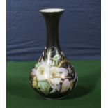 A porcelain hand painted vase