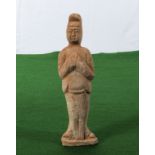 An unglazed Han dynasty style attendant figure