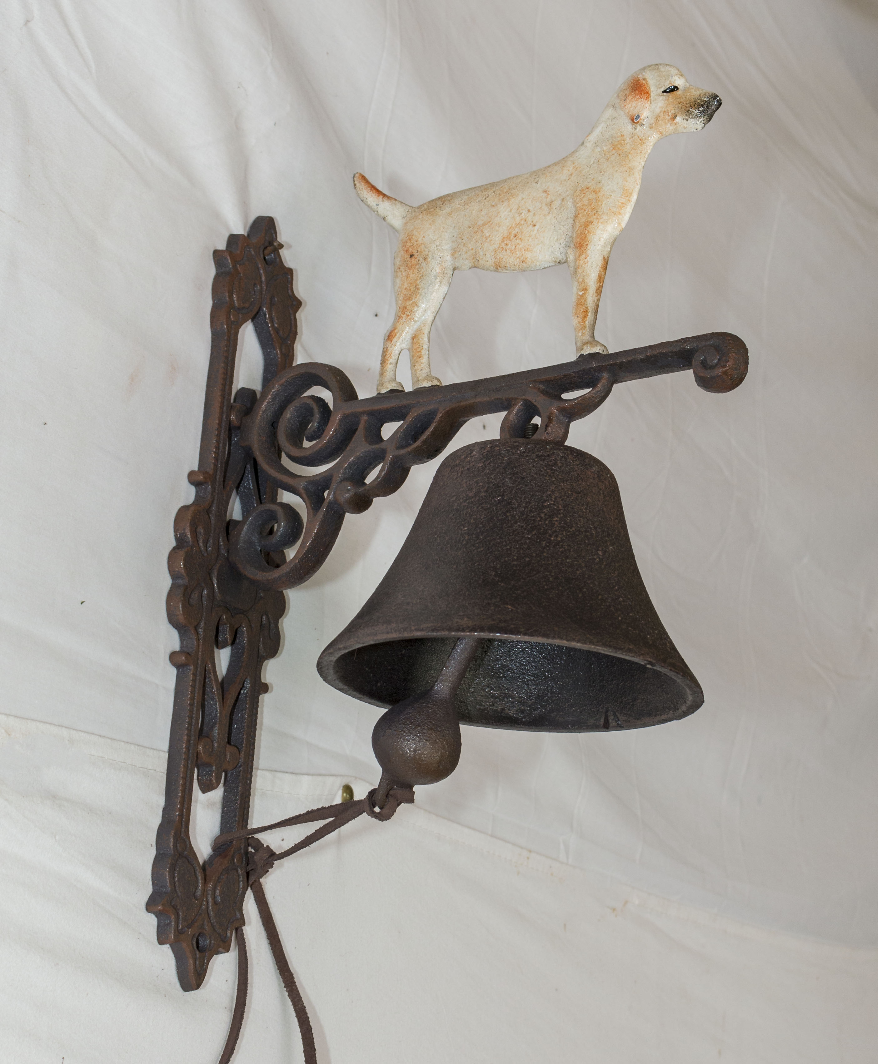 Cast white dog bell