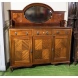 A 1930s mahogany sideboard with mirror back