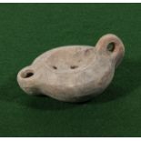 A small Roman oil lamp