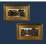 A pair of gilt framed watercolours depicting lake scenes