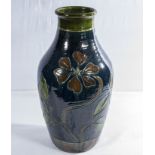 An arts a crafts vase dark blue glaze