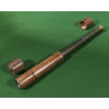 A three draw telescope in leather case