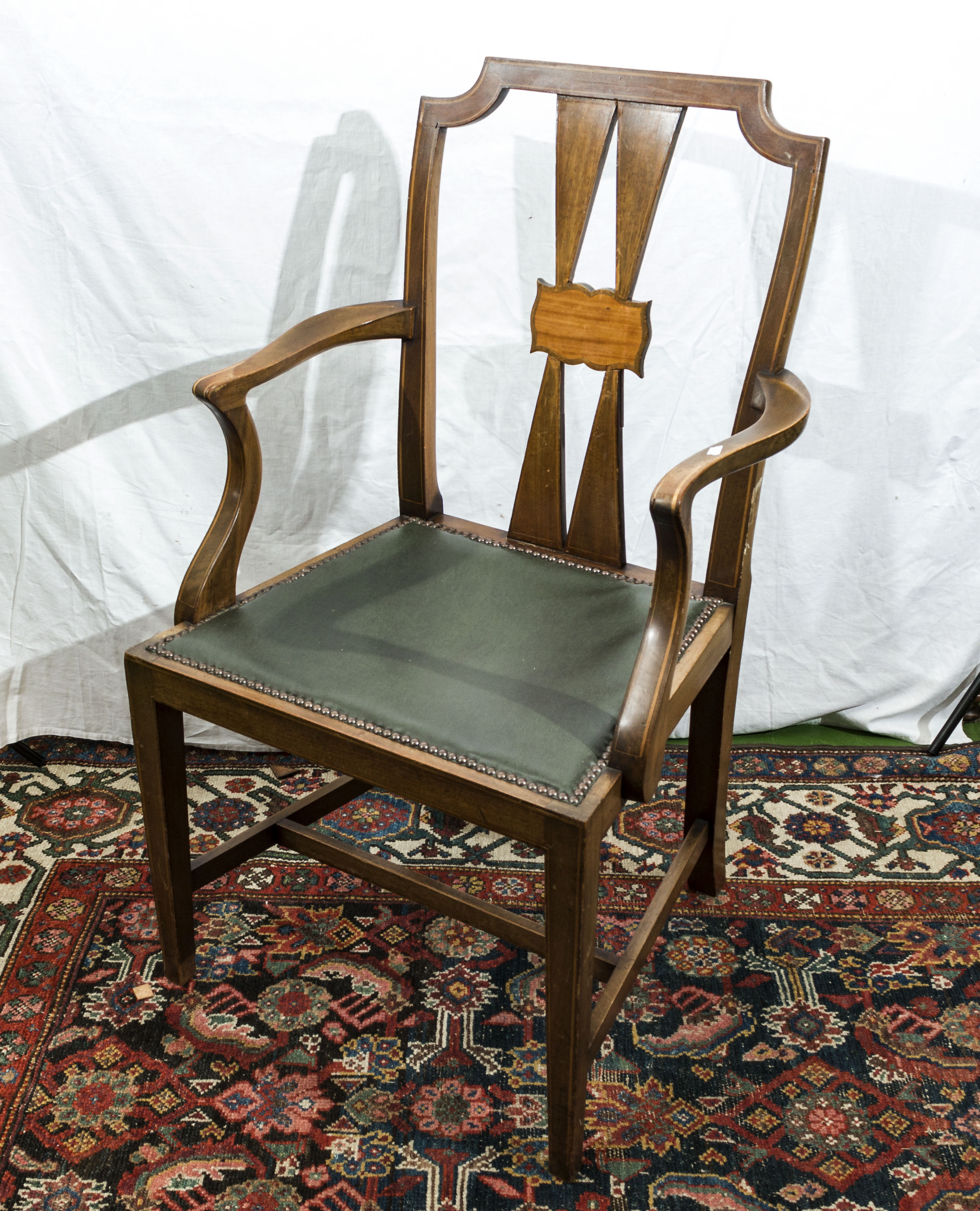 An Edwardian mahogany arm chair