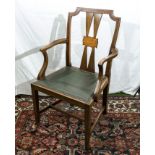 An Edwardian mahogany arm chair