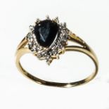 A 9ct gold pear drop shape sapphire and diamond ring, size P