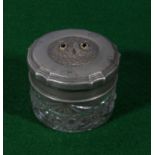 A trinket jar with glass eyed owl lid