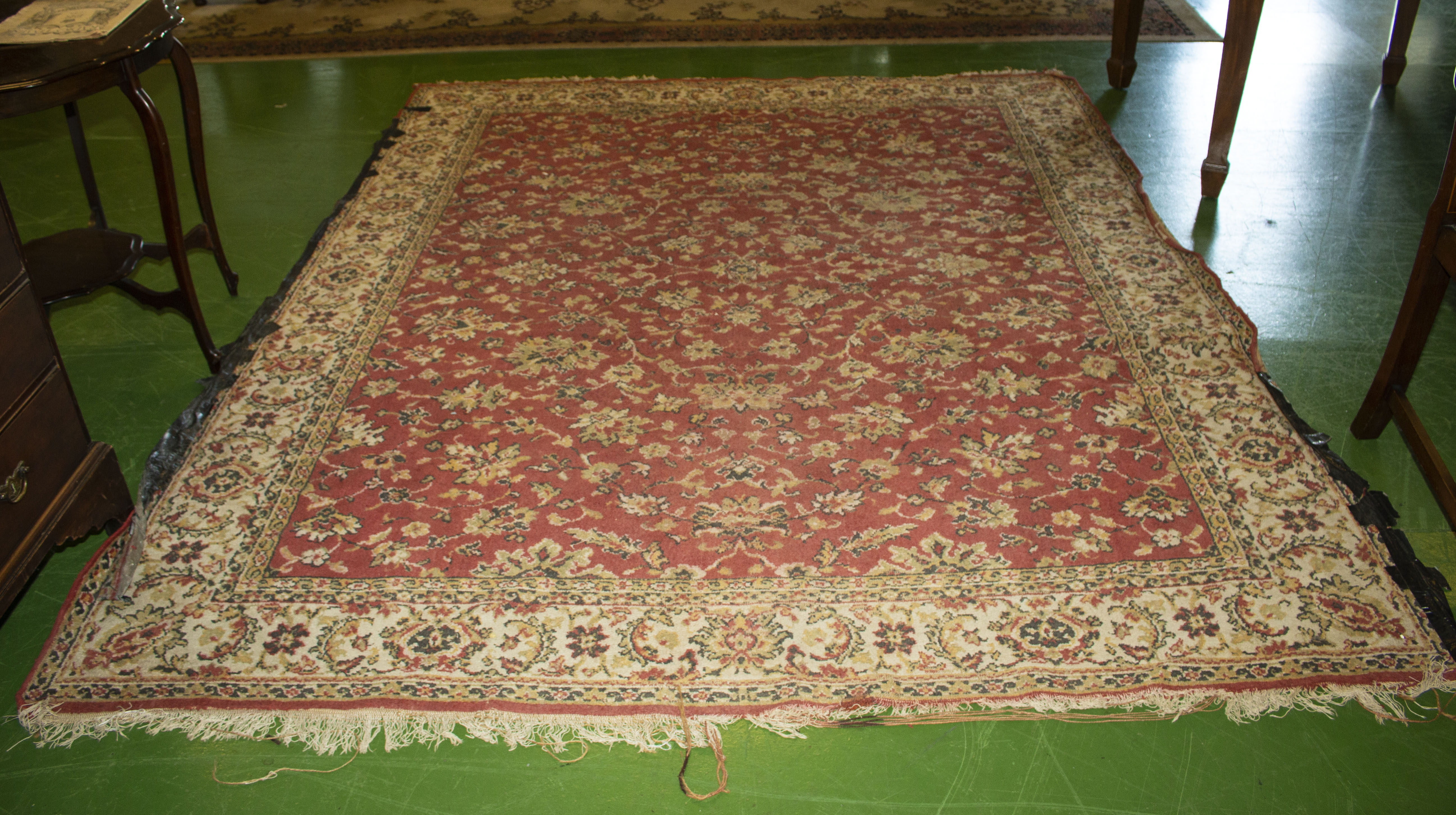 A large red ground wool rug