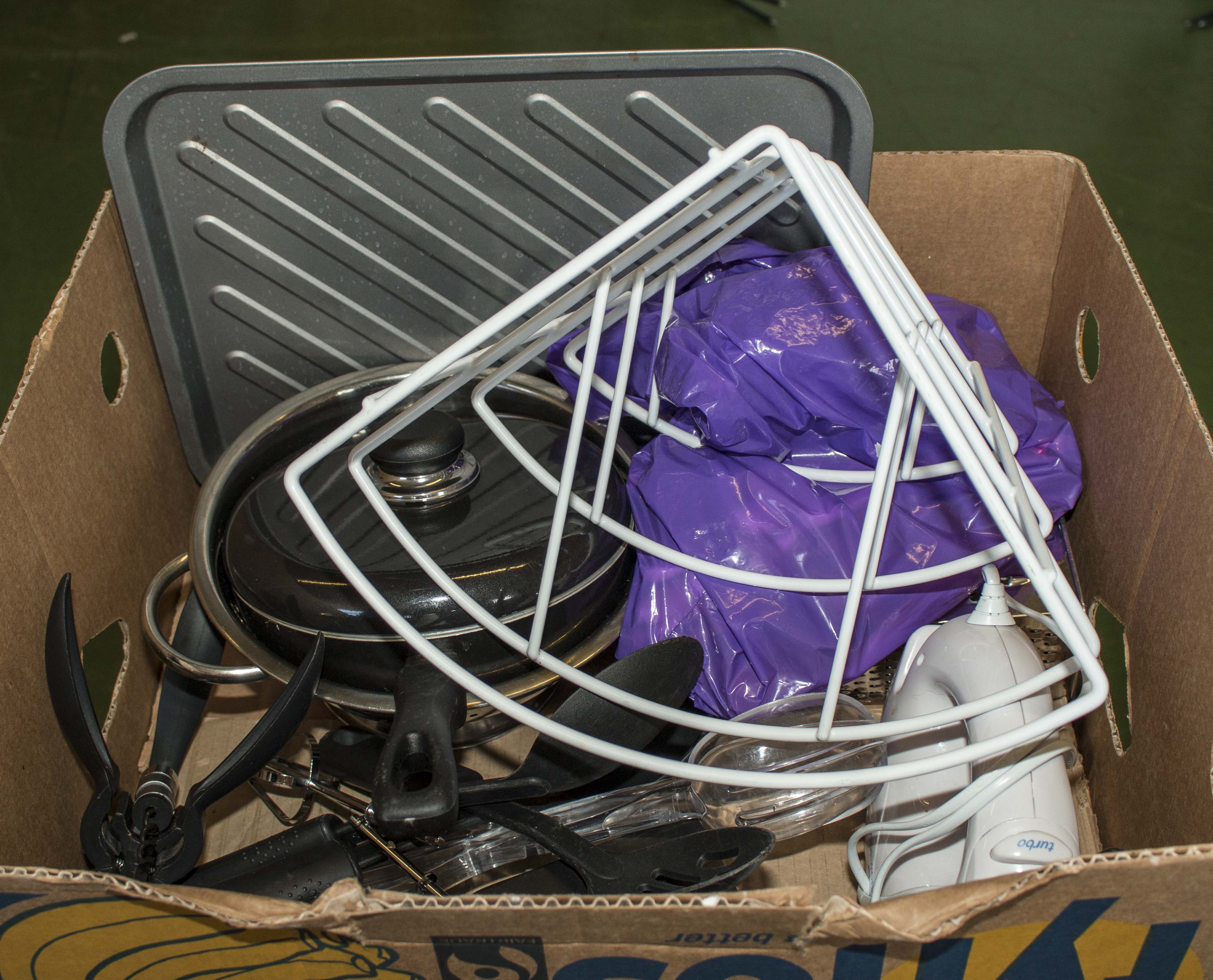 A box containing kitchen ware