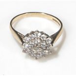 A 9ct yellow gold cubic zirconia cluster ring, size M