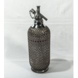 Vintage glass and metal mesh soda syphon by Sparklets Ltd.