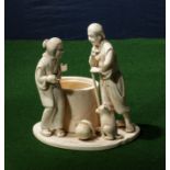 A Japanese ivory of couple with a dog, lady has 2 fingers missing, 14cm by 13cm