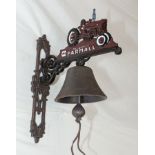 A cast Farmall tractor bell