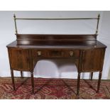 A Regency mahogany sideboard with brass rail