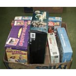 A box of jigsaws and games