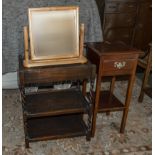 A plant stand, three tier table and a mirror