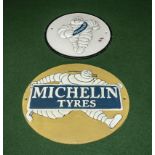 Two cast Michelin Tyres wall plaques