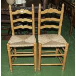 Two pine rush seated kitchen chairs