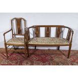 An Edwardian inlaid mahogany 2 seater couch and a matching chair