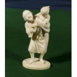 A Chinese ivory of man carrying a child (15cm tall)