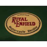 A cast Royal Enfield wall plaque