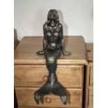 A 16" cast metal mermaid