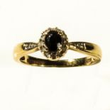 A 9ct gold sapphire and diamond cluster ring, size P