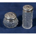 Two cut glass jars with silver lids, marks for Birmingham 1901/04