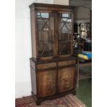 A reproduction mahogany bookcase