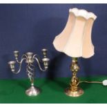 A table lamp and a candelabra
