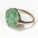 A 9ct yellow gold ring set with a jade stone, size Q