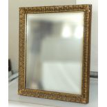 A gilt framed mirror