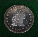 A 1987 2 ounce silver Liberty coin