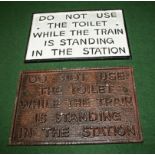 Two cast railway signs